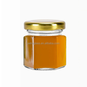 Set di 20 Vasetti per Miele da 45ml Design Esagonale Classico, Bomboniera Multifunzione con Sacchetto in Rete Dorata Trasparente e Coperchi in Metallo, Bastoncino per Miele - Product Image 3