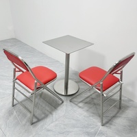 Table de salle à manger extérieure ronde compacte en acier inoxydable, style industriel moderne et épuré, 4 places, pour café et mobilier de salle à manger
