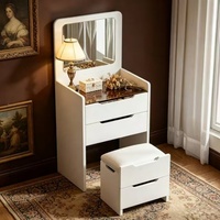 Coiffeuse minimaliste nordique avec miroir arrondi et tabouret rembourré, station de maquillage pour chambre confortable