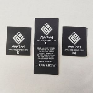 Etiqueta Tejida para Prendas de Vestir de Poliéster Ecológico con Envío Rápido, Accesorios de Procesamiento de Prendas, Logotipo Personalizado, Color y Tamaño, Etiqueta Plegada al Centro - Product Image 1
