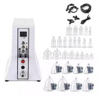 Appareil portable de massage et d'agrandissement des seins et des fesses par aspiration sous vide et vibration, avec pompes et ventouses