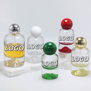 OEM/ODM <b>30ml</b> 50ml 100ml Cylinder Glass <b>Perfume</b> <b>Bottles</b> Screen Printed Gold/Silver/Blue/Red/Green Bottoms Pump Sprayer for Gift - Product Image 1