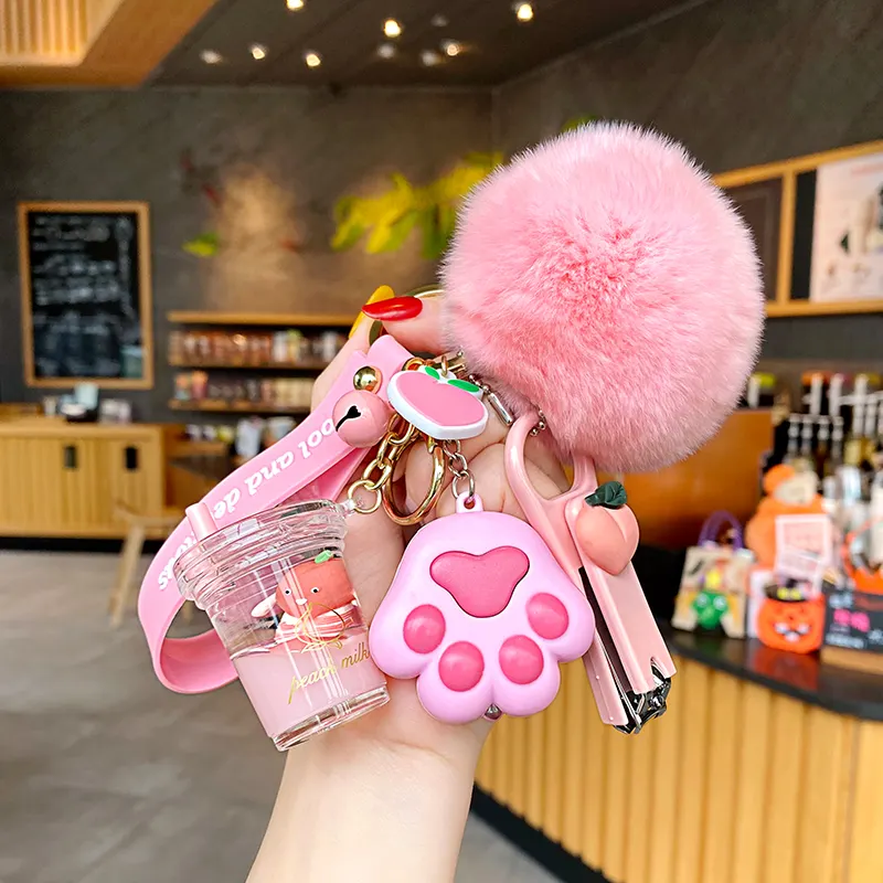 Creative Milk Bottle Crystal Milk Keychain Cute Hairy Ball Flowing Liquid Key Chain Computer Nail Key Chain Bag Pendant