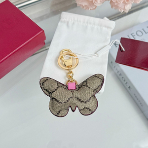 Pendentif de sac unisexe en cuir PU de luxe, motif papillon G, décontracté/sportif, avec nœud créatif, breloque décorative pour <span class=keywords><strong>poupée</strong></span>, bijou à suspendre - Product Image 2