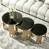 Ensemble de tables basses rondes modernes, plateau en verre trempé noir, structure en métal à tubes cannelés dorés, table d'appoint pour salon