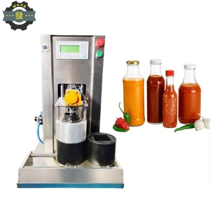 Machine de mise sous vide pour bouteilles en verre pour sauces piquantes à l'<span class=keywords><strong>ail</strong></span>, sauces tomates et sauces bœuf – Ligne de machines de capsulage - Product Image 1