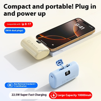 Mini banco de energía 10000mAh con dos enchufes giratorios Pantalla digital PD 20W Cápsula de carga rápida Cargador portátil Salida de