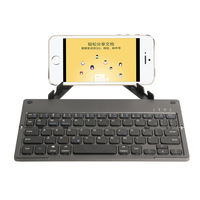 Mini clavier BT pliant 66 touches de haute qualité 2 plis et support sans fil pour PC et Pad pour les jeux
