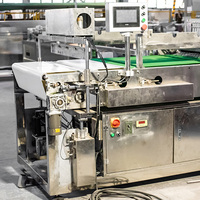 Machine de fabrication de noix de céréales cassantes de sésame, Machine de découpe de barre de Millet soufflé semi-automatique