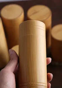 भंडारण के लिए थोक कस्टम पोर्टेबल ठोस लकड़ी बांस ट्यूब बांस ट्यूब चाय टिन
