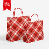 Bolsa de regalo de papel Kraft de Navidad personalizada con asa Embalaje personalizado de fábrica para fiestas Esquema de color rojo y blanco