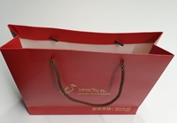 Customized Kraft Paperboard Gift Bag for Clothing Hot Stamping Surface Treatment Recycled Material for Candle Craft Packaging