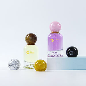 Emballage de parfum en verre rond de 50 ml de luxe en gros, échantillon gratuit, personnalisé, flacon de parfum avec fond volcanique et bouchon à bille, boîte - Product Image 1