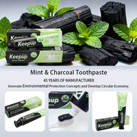 Dentifrice blanchissant à la menthe biologique Keepup avec des propriétés anti-caries, haleine fraîche et antibactériennes 100G Utilisation à domicile