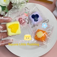 Vente en gros de Squishies en silicone mignons en forme de pudding carré, jouet anti-stress à texture boueuse à récupération lente