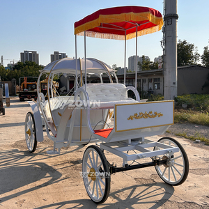 Carruaje eléctrico ZOWN con forma de calabaza, color blanco con techo rojo y adornos dorados, para transporte en bodas al aire libre - Product Image 4