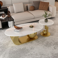 Table basse de luxe de style italien haut de gamme Table à thé en plaque de roche à base de métal doré Table d'appoint basse ovale au design personnalisé