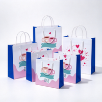 Sac en papier de luxe portable avec poignée en corde, personnalisable avec logo, pour vêtements, cadeaux et emballages de café/boutiques de boissons
