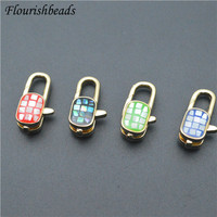 Fermoirs de 18mm de long en laiton rouge, noir, vert, bleu, métal naturel, forme ovale, pour la fabrication de bijoux, de bracelets et de colliers.