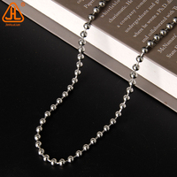 Store à fenêtre unique traditionnel avec conception de chaîne de perles en métal