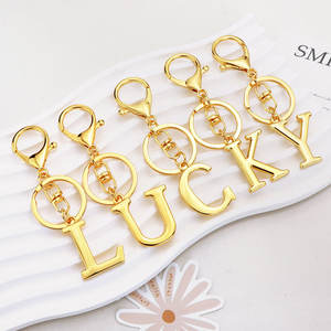 Hertiny HTS4641 Llavero de dibujos animados con alfabeto de la A a la Z, de aleación de color dorado, con colgante de letra inicial de burbuja con diseño de globo y monedero - Product Image 3