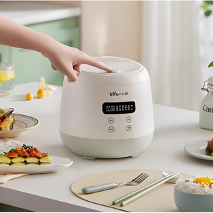 หม้อหุงข้าวลิตเติ้ลแบร์ 2 ลิตร สีขาวเขียว หม้อเซรามิกต้านเชื้อแบคทีเรีย ตัวตั้งเวลาอเนกประสงค์ ปรุงอาหารได้รวดเร็ว - Product Image 1