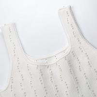 Nouvelle collection Printemps 2026 : Robe trapèze vintage française en nylon antistatique, ornée de strass imitation diamant, texturée verticalement et cintrée à la taille.