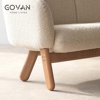 Canapé Chesterfield trois places au design scandinave, rembourré et recouvert de tissu, pour salon et zones de réception