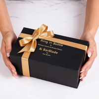 Boîte d'emballage pour whisky en carton rigide noir mat écologique avec ruban doré et logo personnalisé, en papier recyclé pour les spiritueux et les liqueurs