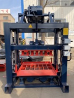 Machine à fabriquer des blocs de béton à haute efficacité QTJ4-40, machine à briques robuste pour la construction de blocs creux