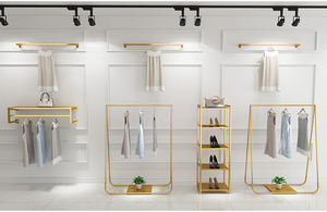 Estante de pared de Ropa de Oro boutique de lujo moderno Constom con mesa de anidación estantería de ropa ideal para muebles de <span class=keywords><strong>tienda</strong></span> de ropa - Product Image 3