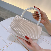 Abito da sera in raso con texture transfrontaliera pochette con patta plissettata di perle con fodera in poliestere chiusura aperta borsa alla moda 2025
