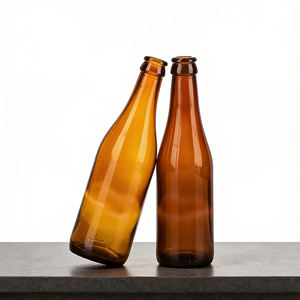 Botellas de cerveza de vidrio ámbar redondas vacías de 330ml y 540ml, fabricadas en fábrica, con cuello largo, rellenables, para bebidas y licores, con tapa corona. - Product Image 1