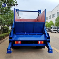 Haute qualité HOWO camion à ordures 4X2 5CBM 10CBM crochet bras camion à ordures compresseur de déchets pour la Papouasie-Nouvelle-Guinée