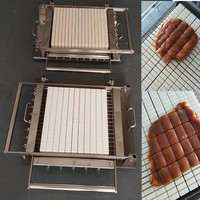 Vente chaude En Acier Inoxydable Double Bras Chinchin Cutter Snack Chocolat Laser Gelée Bonbons Machine De Découpe pour Un Usage Domestique