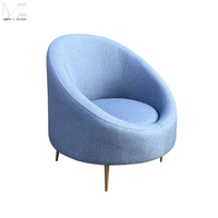 Fauteuil de luxe design vintage en petit velours bleu orange pour salon chambre appartement salle à manger ou hôtel loisirs