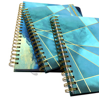 2026 Agenda A6 venta al por mayor pequeños planificadores de lujo a granel espiral Tapa dura Impresión de cuaderno personalizado