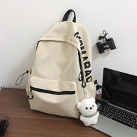 Sac à dos unisexe léger en denim au design tendance pour étudiants et lycéens, avec fermeture éclair et doublure en polyester