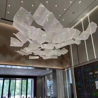 Luminaires suspendus haut de gamme coréens pour hôtels, style « Fish-line », avec grille de perles ananas et rubans fluides