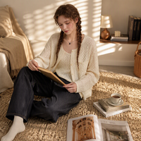 Cardigan d'été Letm style anglais en jacquard ajouré tricoté, à col rond, manches longues, coupe régulière, uni, avec détails boutonnés et découpes, ajustable