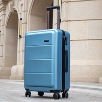 Valise de voyage personnalisée de luxe en aluminium avec ouverture frontale, en ABS+PC, avec serrure TSA et 4 roues pivotantes pour une utilisation en extérieur