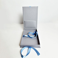 Boîte de paquet de vêtements cadeau magnétique en forme de livre en tissu de lin de luxe personnalisée boîte de papier de haute qualité pour l'emballage de parfum de vêtement
