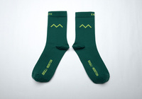 Chaussettes de cyclisme sur route de performance pour équipes, vertes, par sublimation, respirantes, personnalisables, pour le vélo, vente en gros, fabricant