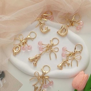 Portefeuille en cuir mignon populaire d'inspiration européenne et américaine avec motif lettres bulles, cerise et nœud pour sacs - Product Image 5