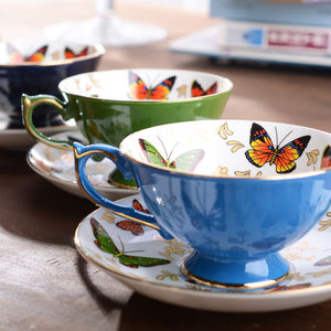Ensemble de tasses à café éthiopiennes en porcelaine de haute qualité avec bordure dorée et motifs de papillons colorés, ensembles de tasses à thé en céramique avec soucoupes - Product Image 1