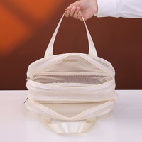 Sac de toilette de voyage à double couche en maille grande capacité, organiseur de cosmétiques multifonctionnel avec doublure en PVC lavable pour femmes