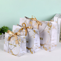 Sac de luxe blanc de marque JYF avec fermeture magnétique et poignées, impression personnalisée, fournisseur en gros de chaussures et vêtements, vente au détail internationale