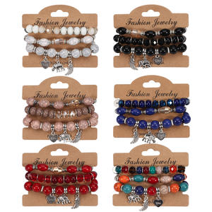 Joyería de Moda, Juego de Pulseras con Dijes de Elefante y Alas de Marfil, Regalo Unisex, Hecho en China - Product Image 1