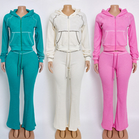 Ensemble de vêtements en maille gaufrée pour femme, personnalisé par le fabricant, avec logo en caoutchouc, comprenant un crop top à manches longues et un pantalon évasé de jogging, ensemble loungewear