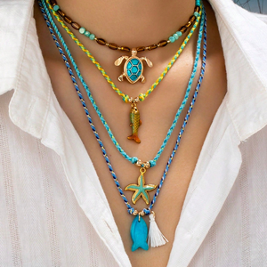 Collier tressé à la main style bohème <span class=keywords><strong>avec</strong></span> breloque océanique, réglable, idéal pour <span class=keywords><strong>les</strong></span> vacances et <span class=keywords><strong>les</strong></span> séances <span class=keywords><strong>photo</strong></span> - Product Image 1